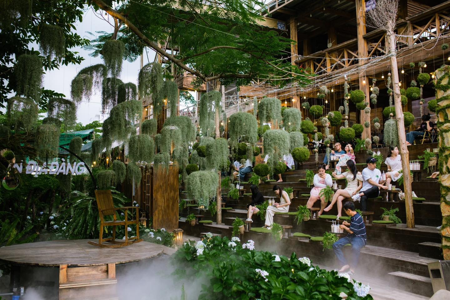 The space at Nong Oi Coffee Shop features a traditional wooden stilt house inspired by Vietnam’s northern highlands
